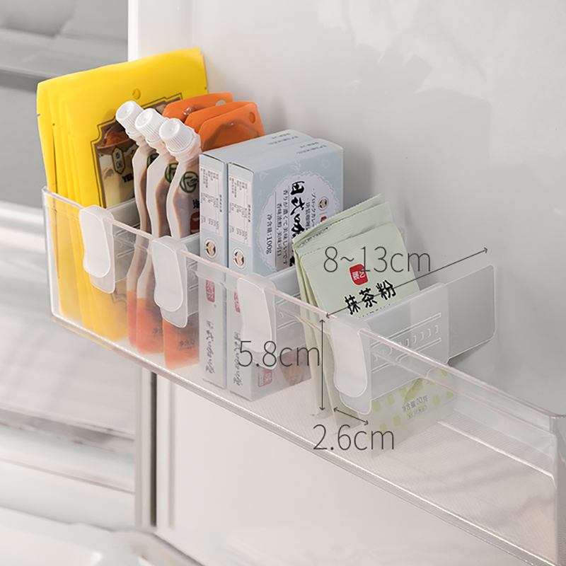 Kẹp nhựa chia ngăn trên cánh cửa tủ lạnh