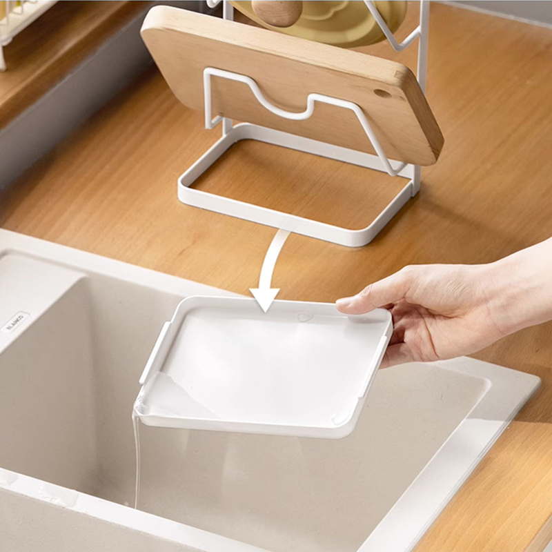 Giá đỡ nắp nồi và dụng cụ làm bếp để bàn